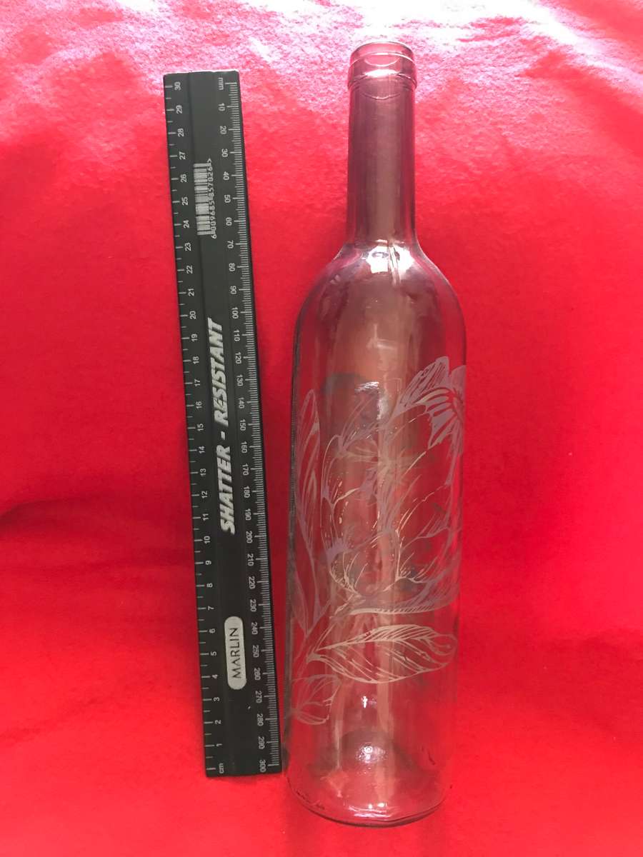 Protea painting on pink bottle