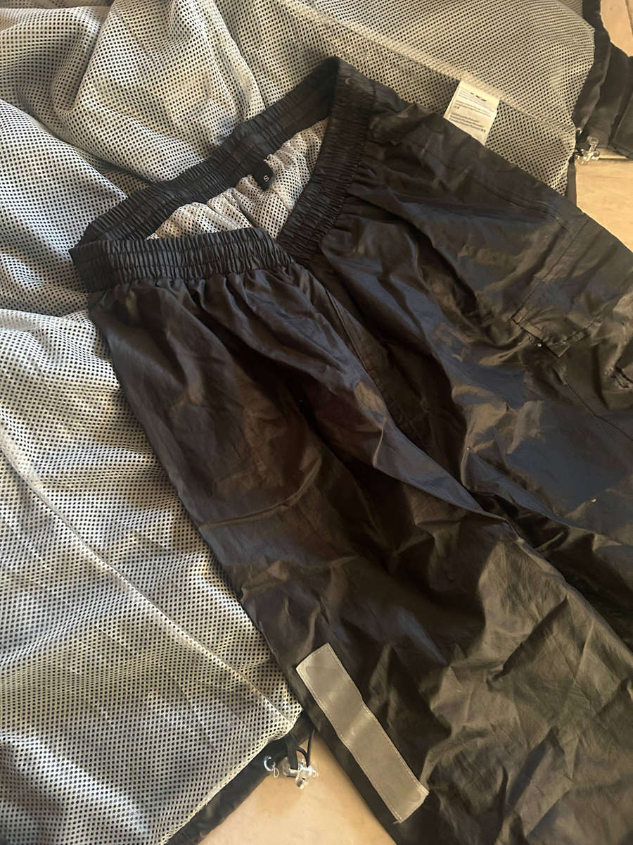 Black LS2 Mens S/M motorcycle waterproof Rain Suit for sale in Excellent condition
