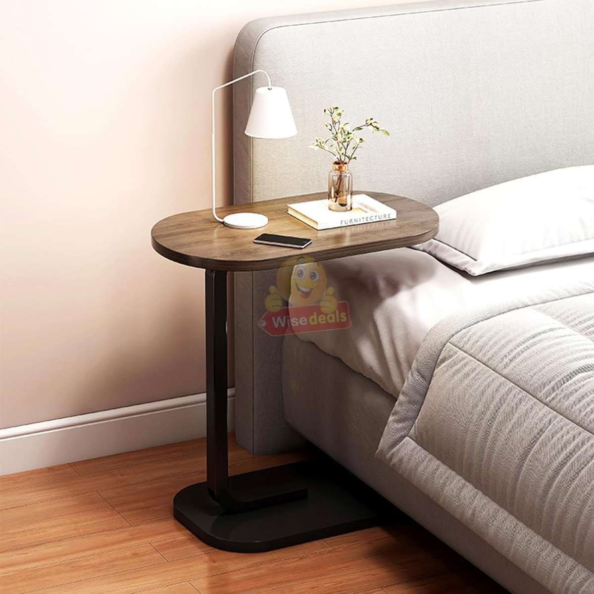 Wooden oval coffee table with a sleek C-shape metal frame