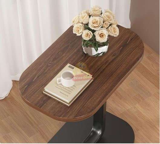 Wooden oval coffee table with a sleek C-shape metal frame