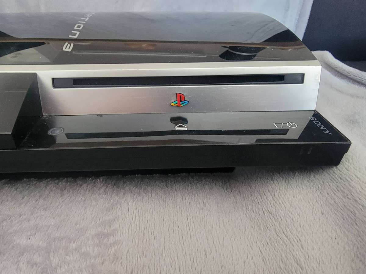 FAULTY PLAYSTATION 3 ON AUCTION - Turns on but shows red & green LED!