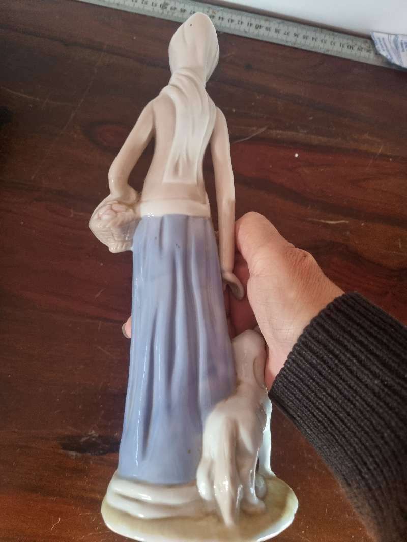 Large Lladro like lady with dog