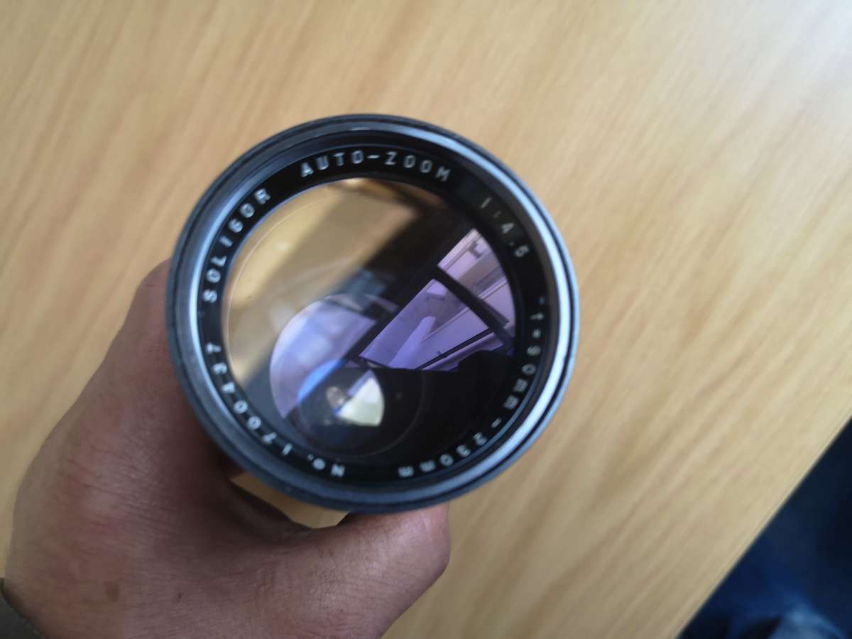 Soligor AUTO ZOOM 90-230mm f/1:4.5 CANON mount lens in good condition with leather case