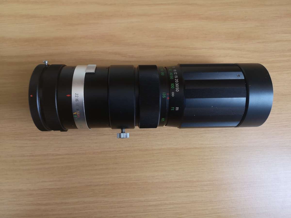 Soligor AUTO ZOOM 90-230mm f/1:4.5 CANON mount lens in good condition with leather case