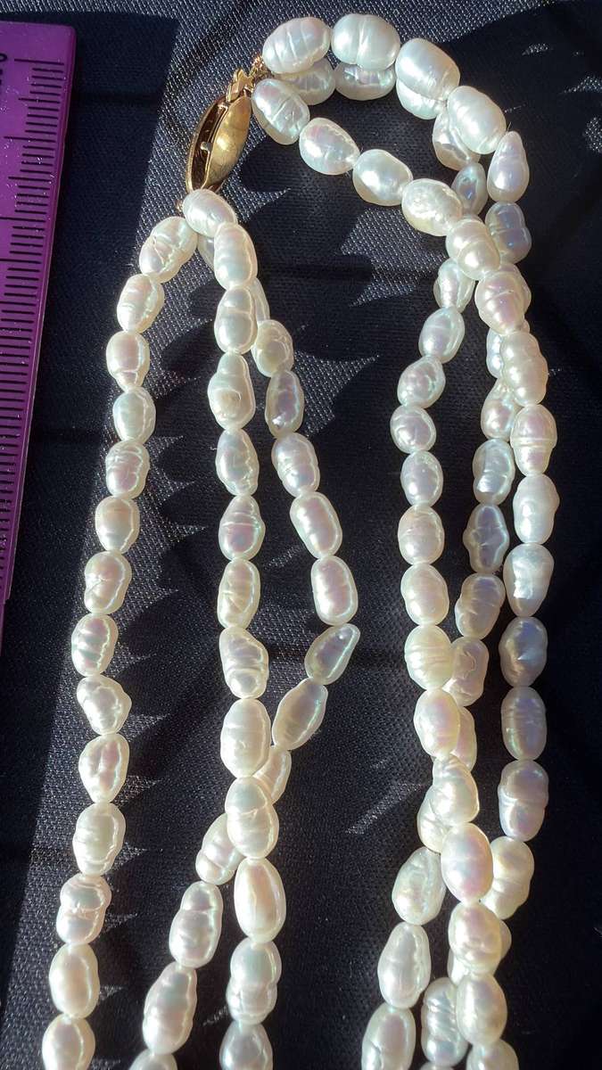 Multi Strand braided necklace with white rice or baroque freshwter pearls