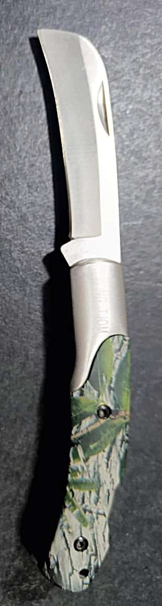 Ridgeline of New Zealand Camo Biltong Tjom. Biltong Knife