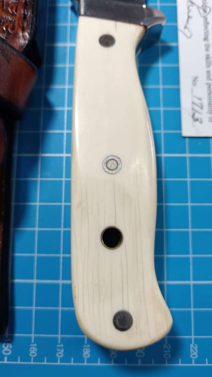 Hand made knife by Johann Kleynhans with sheath