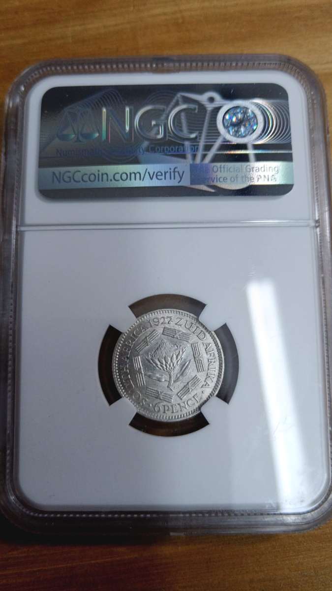 1927 6 pence graded AU55