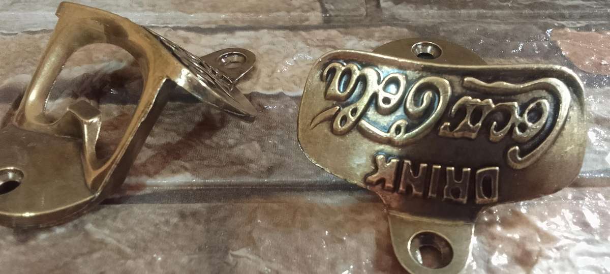 coca cola brass embossed openers x2