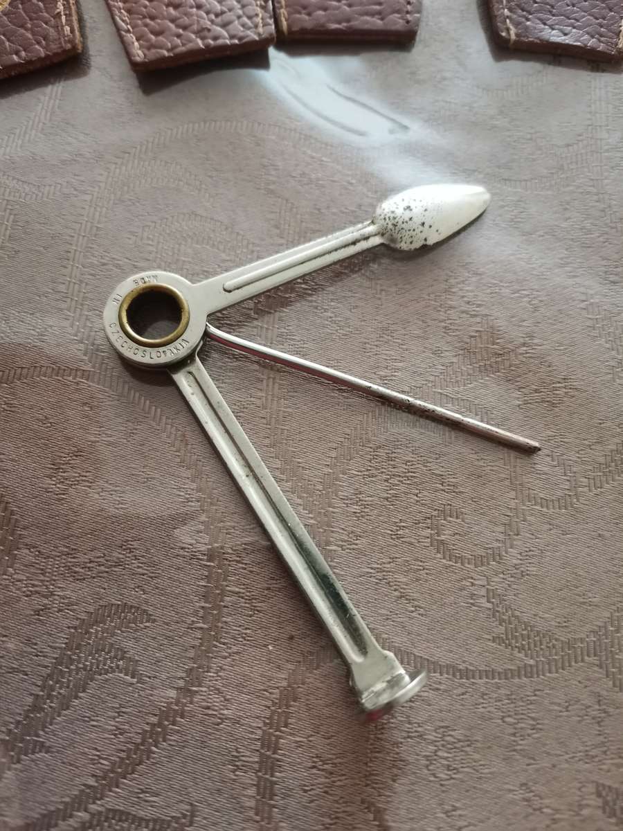 Vintage pipe tool and pipe holders