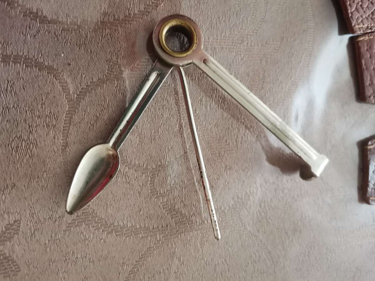 Vintage pipe tool and pipe holders