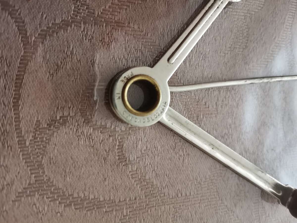 Vintage pipe tool and pipe holders