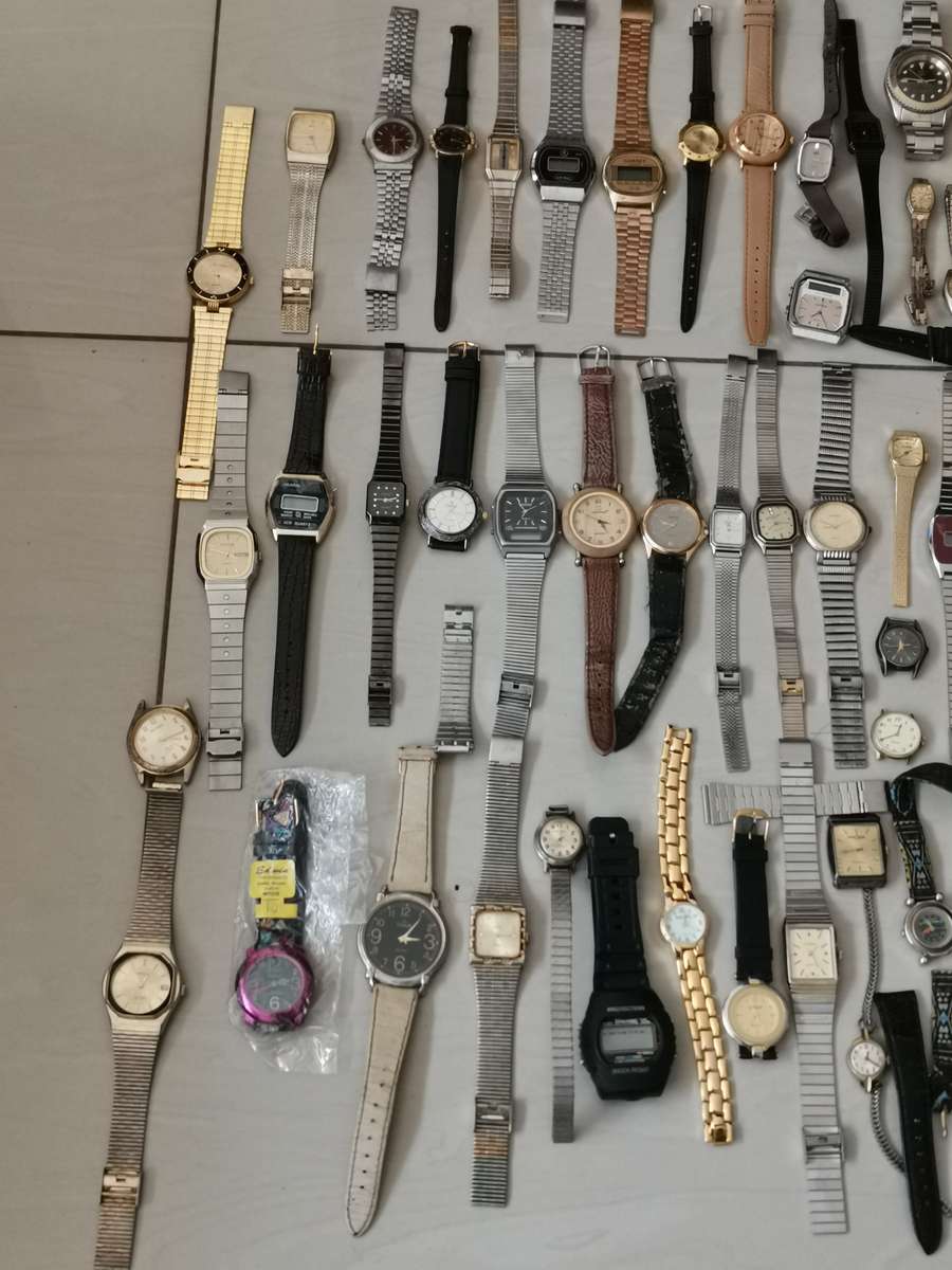 Ex watchmakers uncollected stock 130 watches
