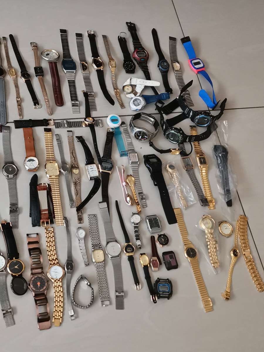 Ex watchmakers uncollected stock 130 watches