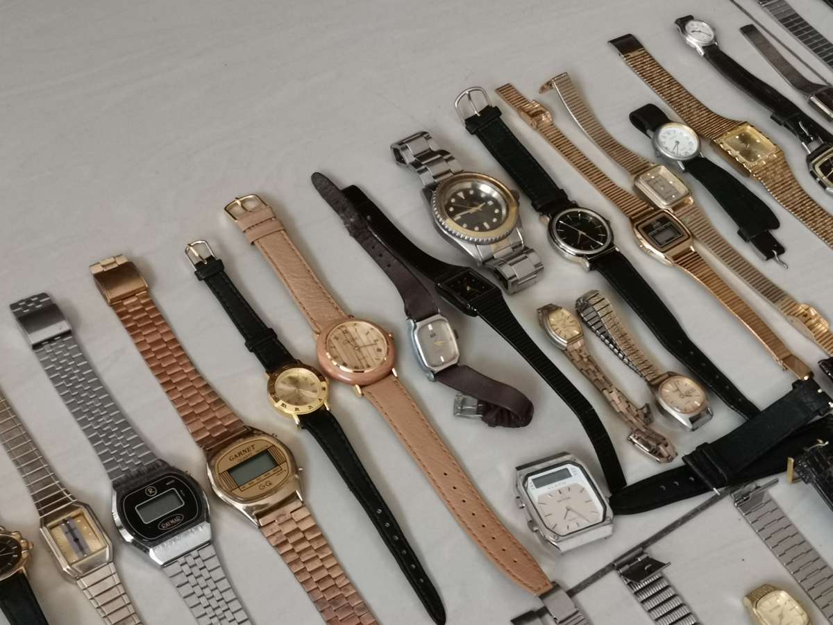 Ex watchmakers uncollected stock 130 watches