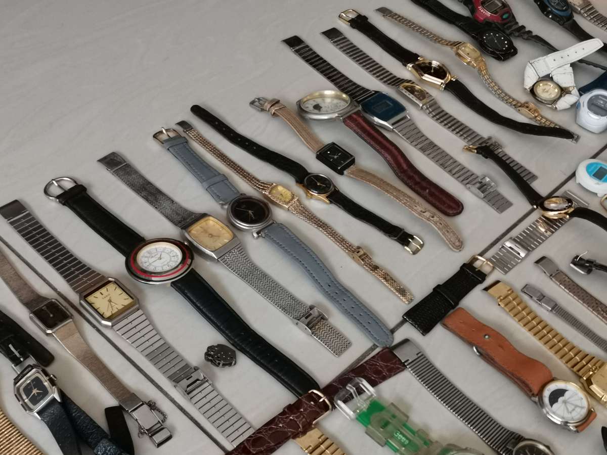 Ex watchmakers uncollected stock 130 watches