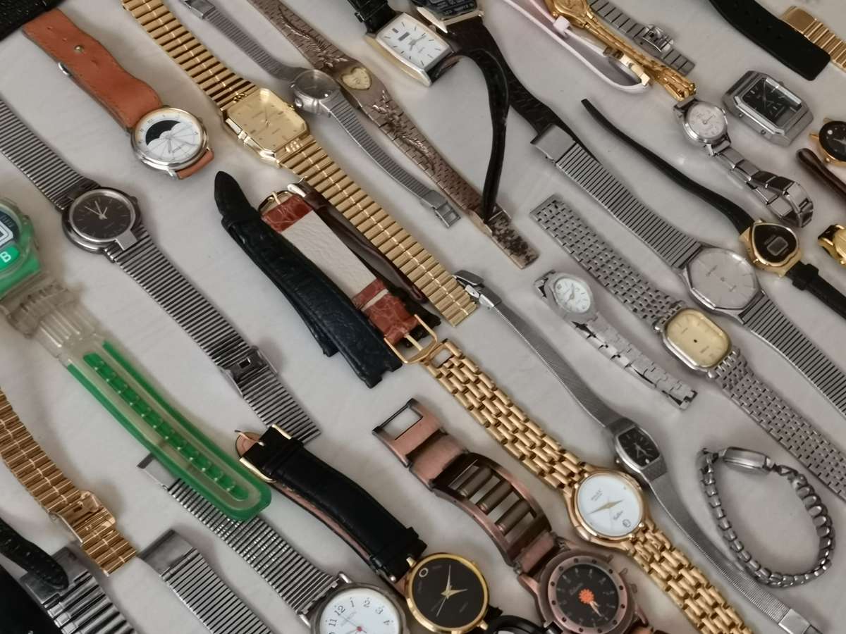 Ex watchmakers uncollected stock 130 watches