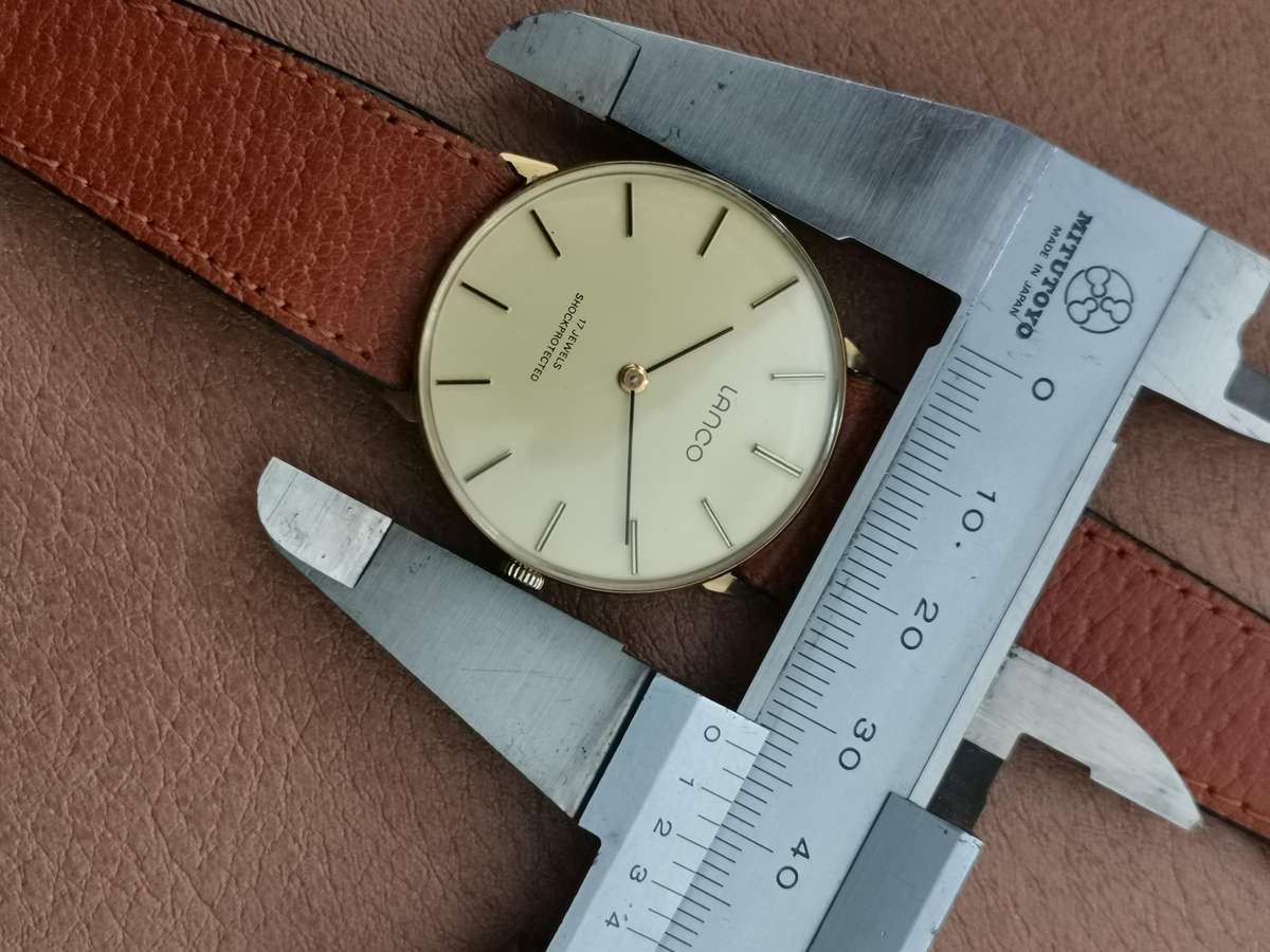 Vintage Lanco penny flat 17 jewels manual wind watch manual wind watch