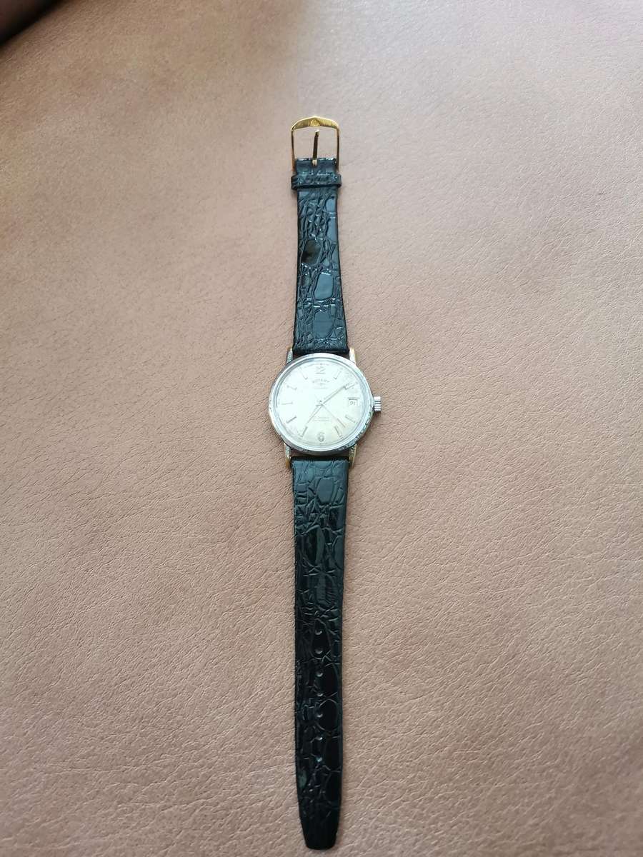 Vintage rotary calendar 21 jewels incabloc manual wind watch