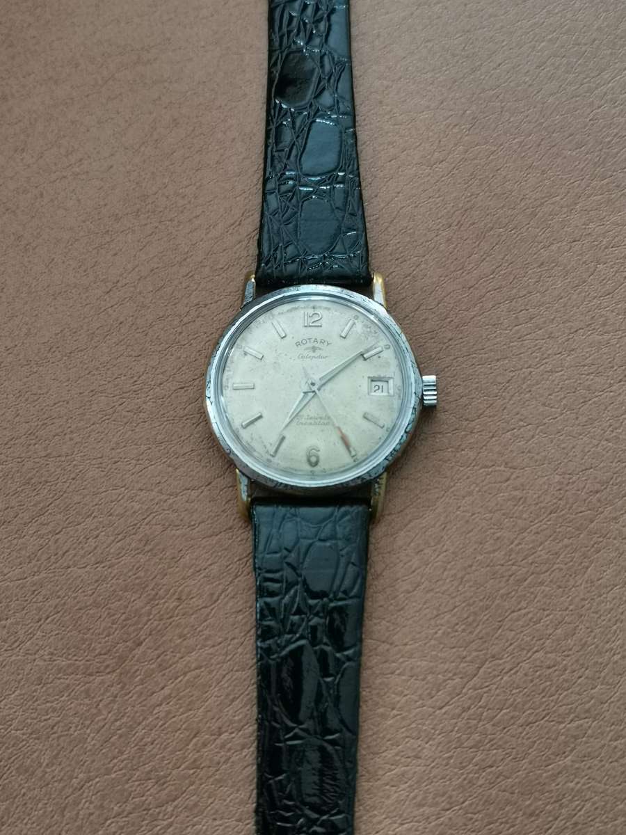 Vintage rotary calendar 21 jewels incabloc manual wind watch