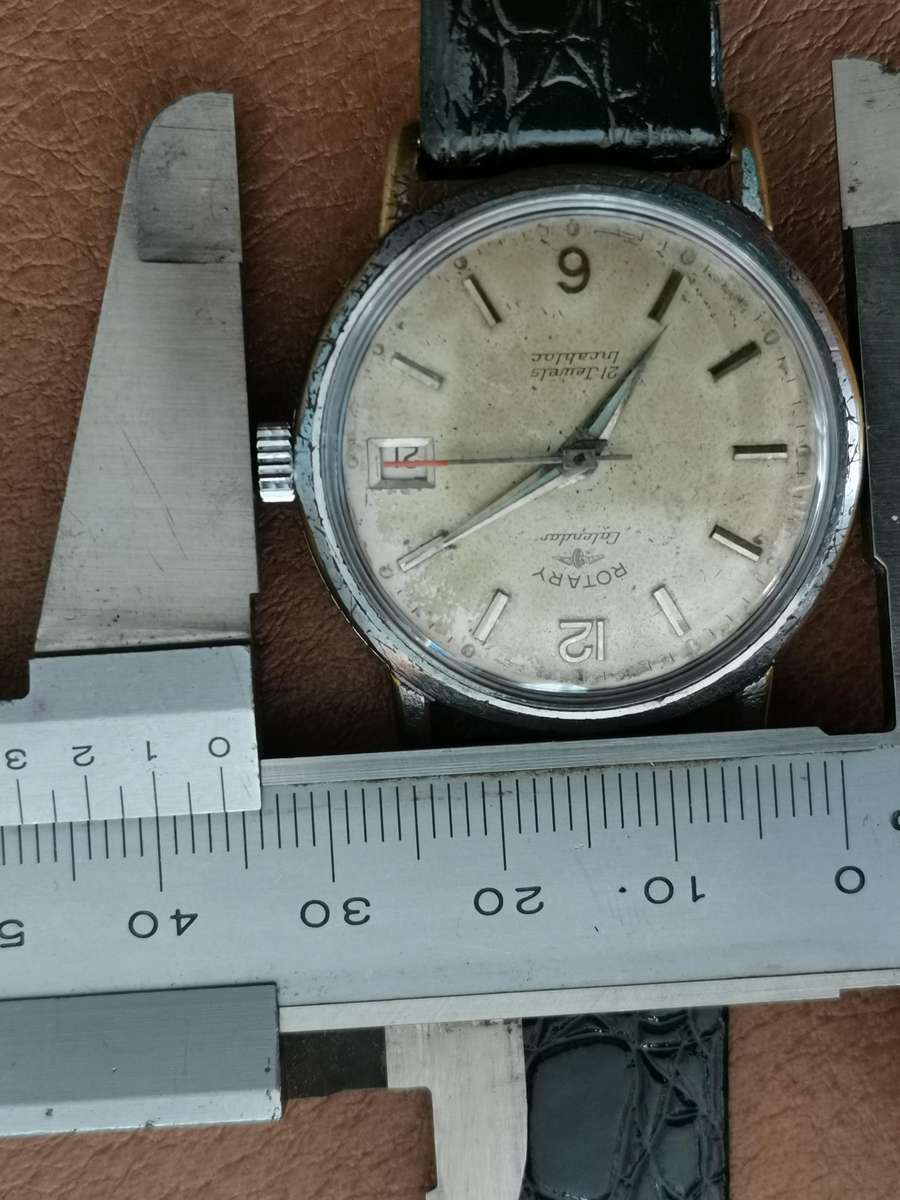 Vintage rotary calendar 21 jewels incabloc manual wind watch