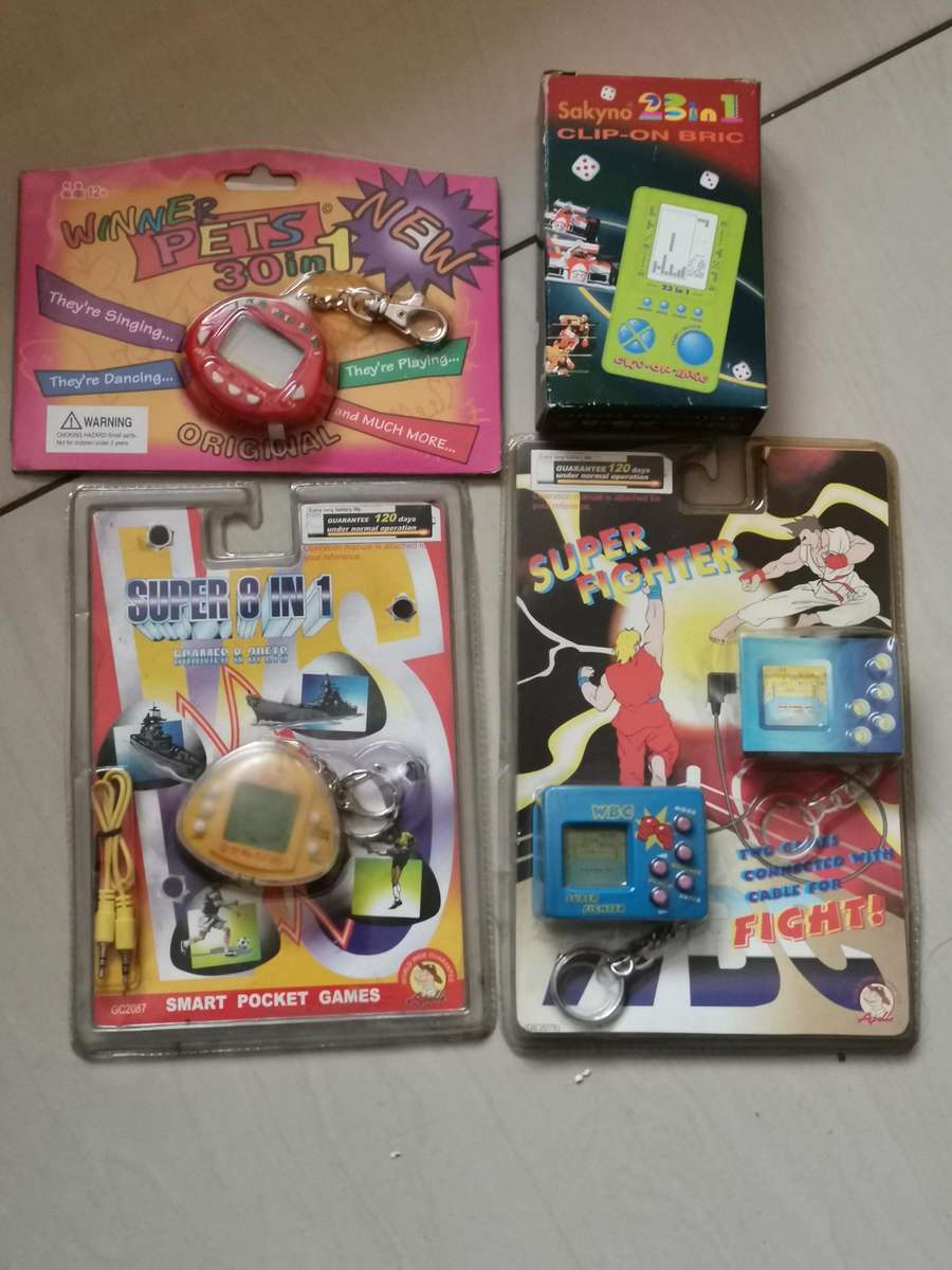 4 new old stock vintage handheld games
