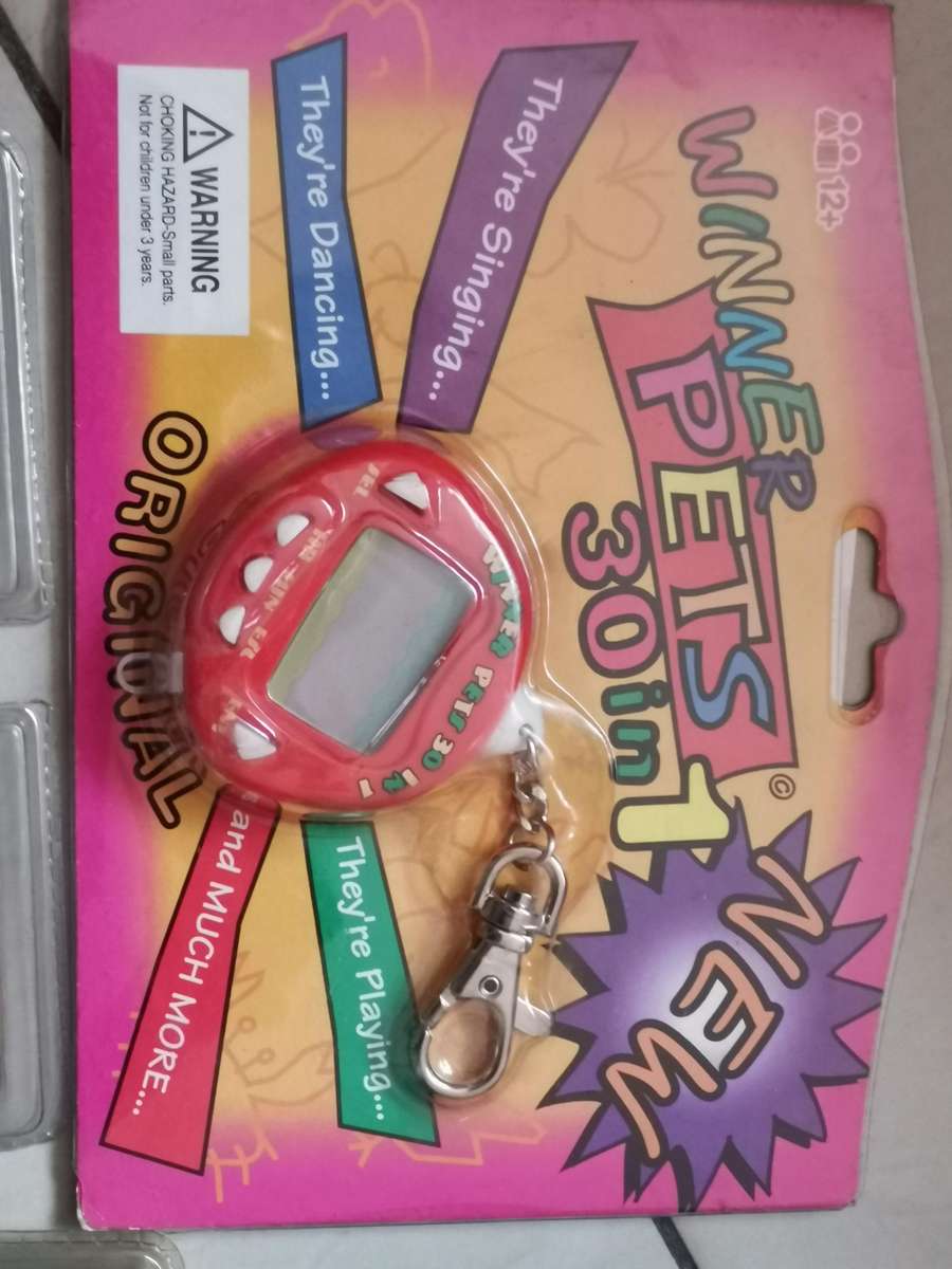 4 new old stock vintage handheld games