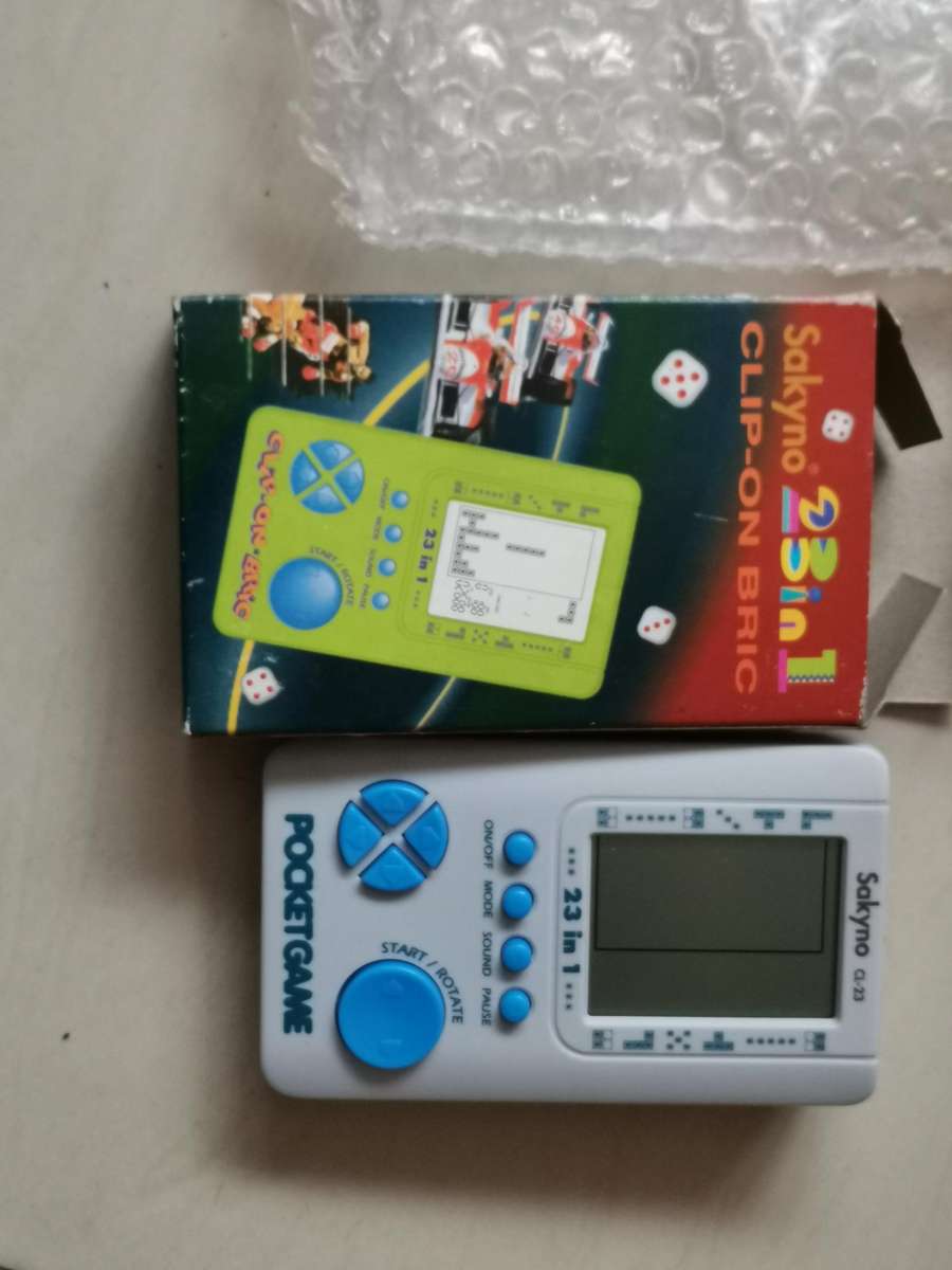 4 new old stock vintage handheld games