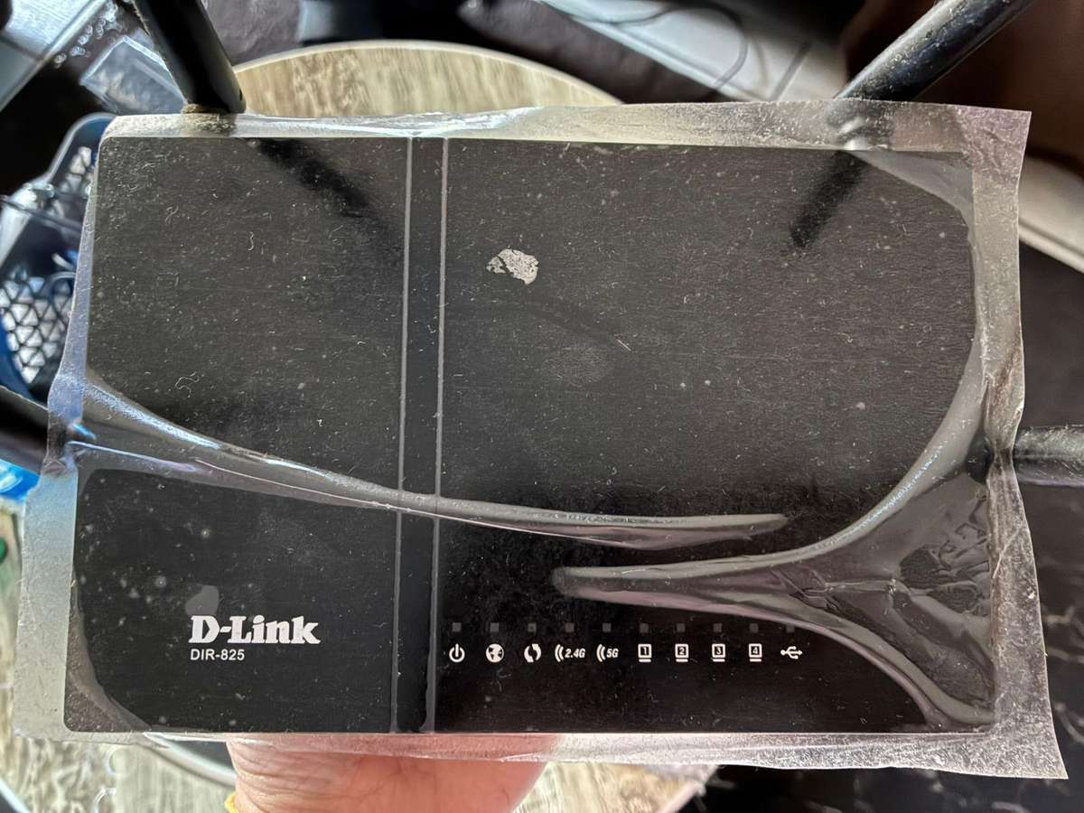 Lot 4 Routers and 1 UPS - 1 BID GETS ALL