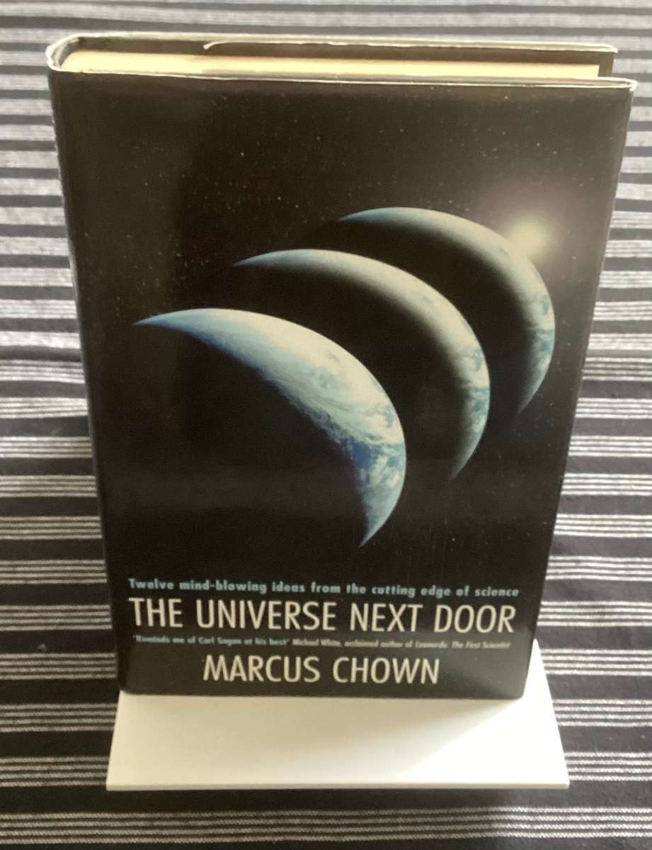 The Universe Next Door, by Marcus Chown. Hardcover, V Good condition.
