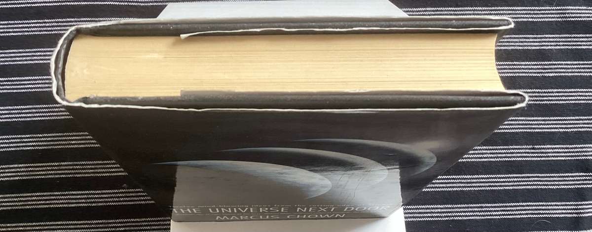 The Universe Next Door, by Marcus Chown. Hardcover, V Good condition.