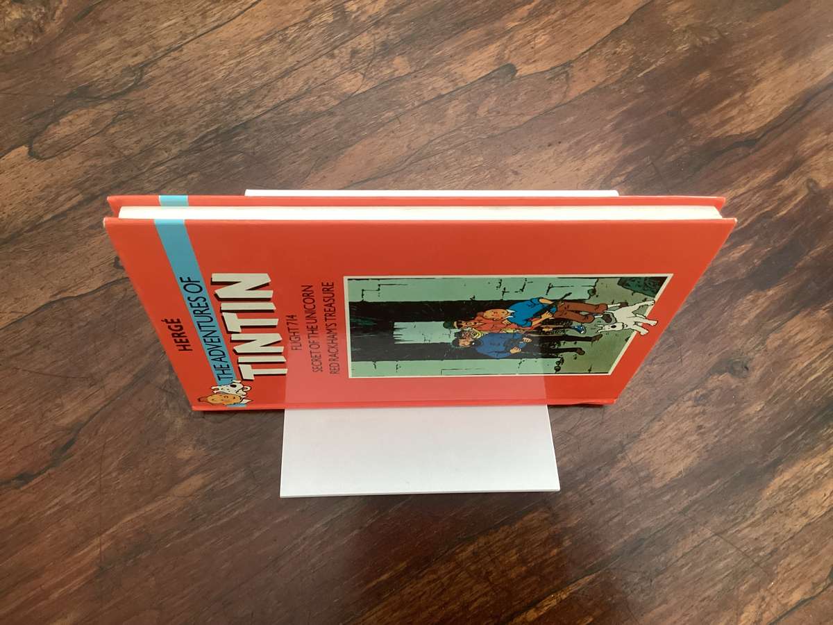 The Adventures of TINTIN (3 titles in one hardcover book). Excellent clean and fresh condition.
