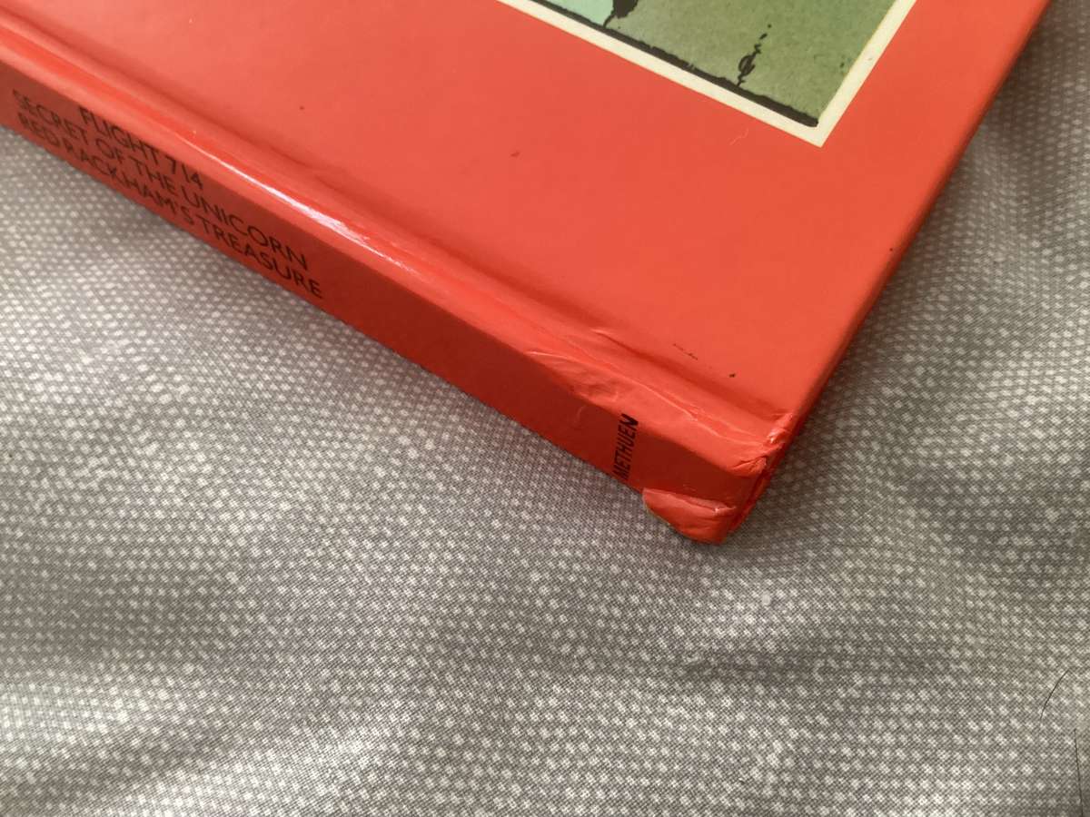 The Adventures of TINTIN (3 titles in one hardcover book). Excellent clean and fresh condition.