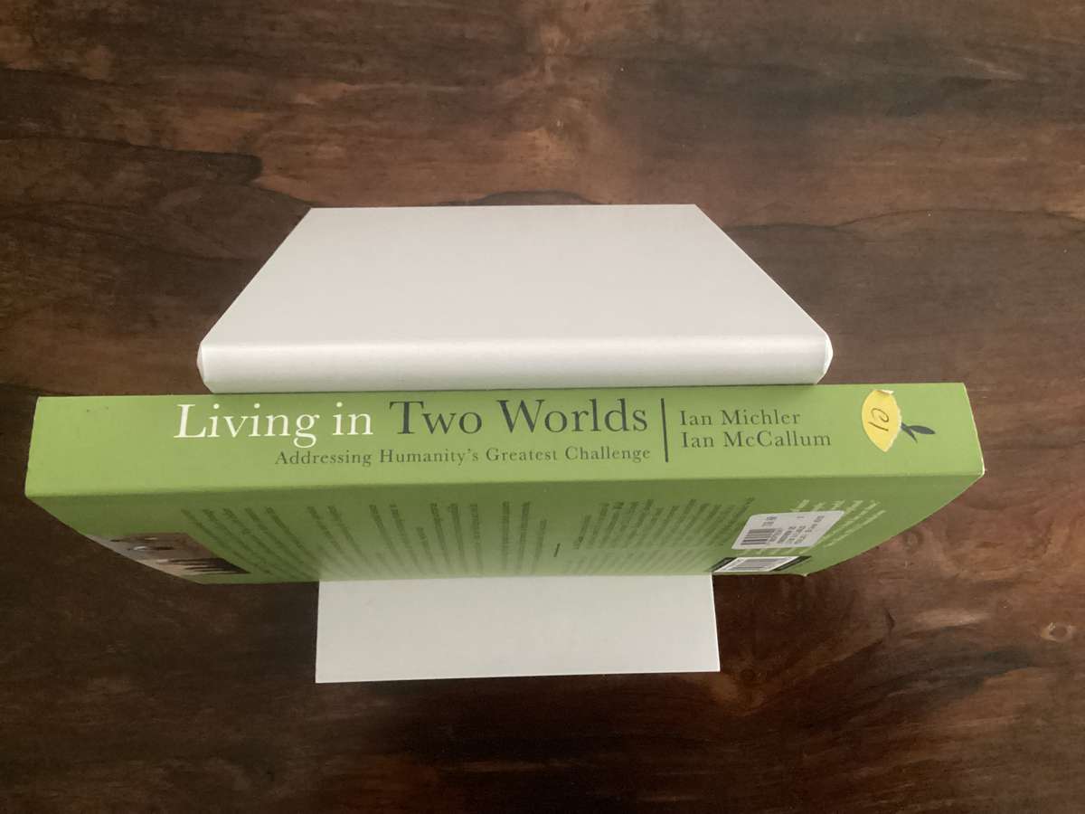 Living in Two Worlds, by Ian McCallum & Ian Michler. Trade Paperback in a VGood condition.