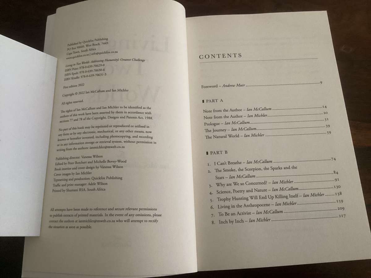 Living in Two Worlds, by Ian McCallum & Ian Michler. Trade Paperback in a VGood condition.