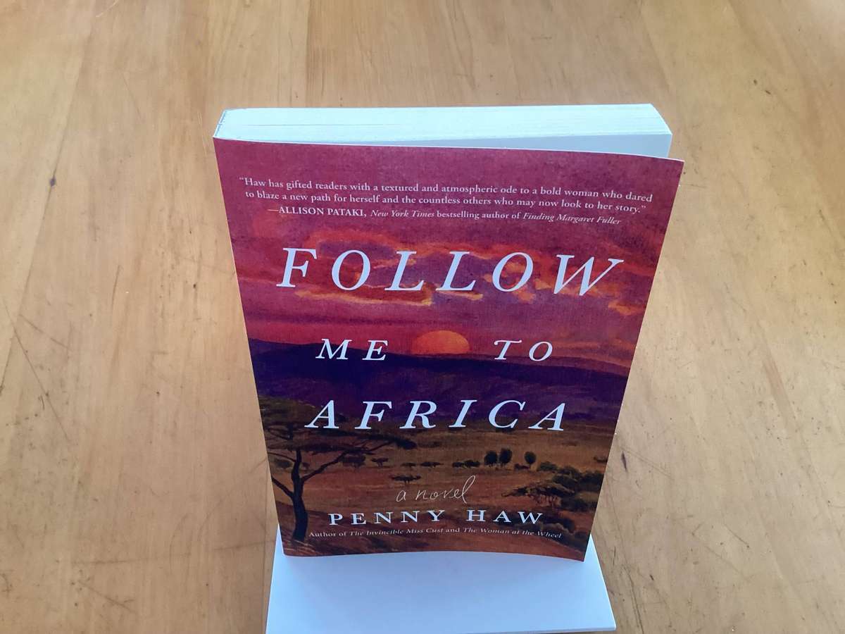 FOLLOW ME TO AFRICA. A novel by Penny Haw. Paperback in a new condition.