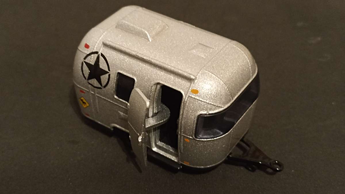 Two 1/64 scale caravans: Greenlight and Majorette