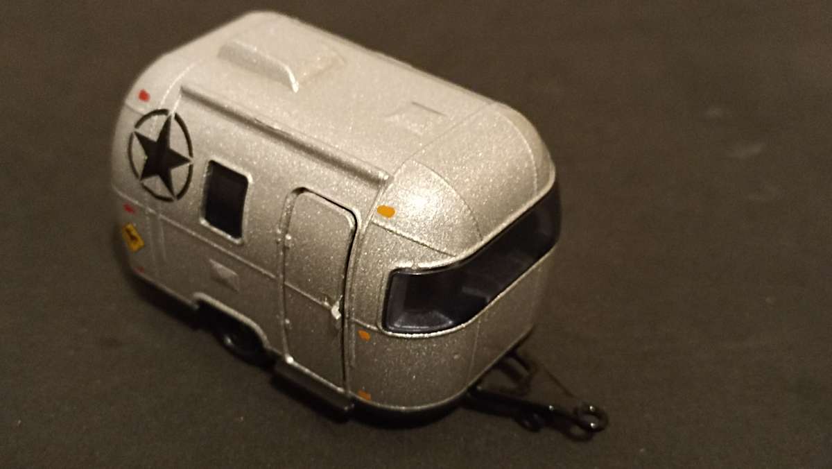 Two 1/64 scale caravans: Greenlight and Majorette