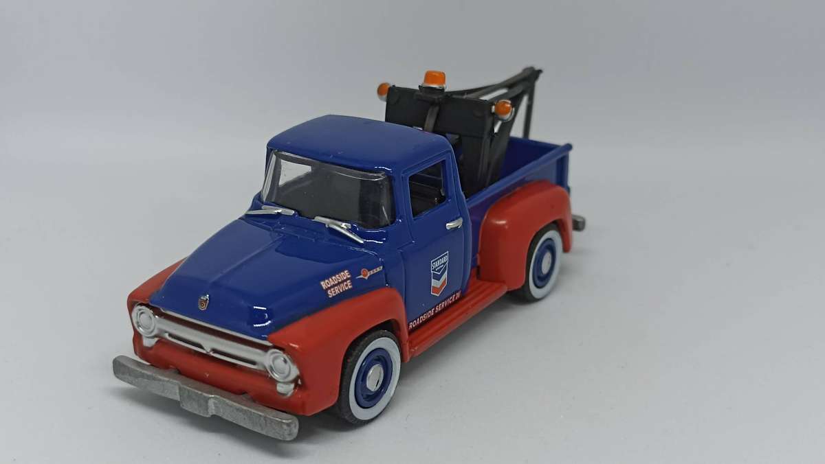 Greenlight 1:64 Ford Mustang and two F100 tow trucks.
