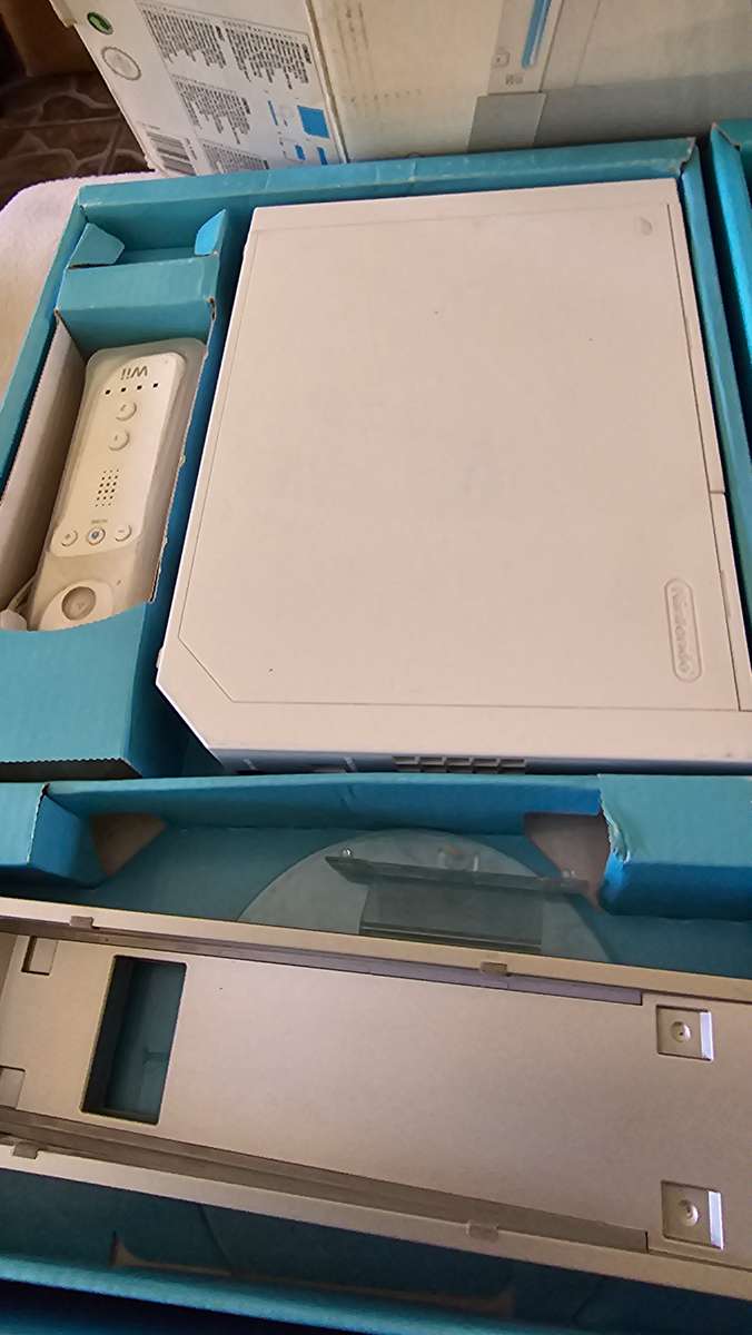 NINTENDO WII CONSOLE INCL. A REMOTE,NUNCHUK ADAPTER AND CABLES( NO POWER SUPPLY) WITH ORIGINAL BOX