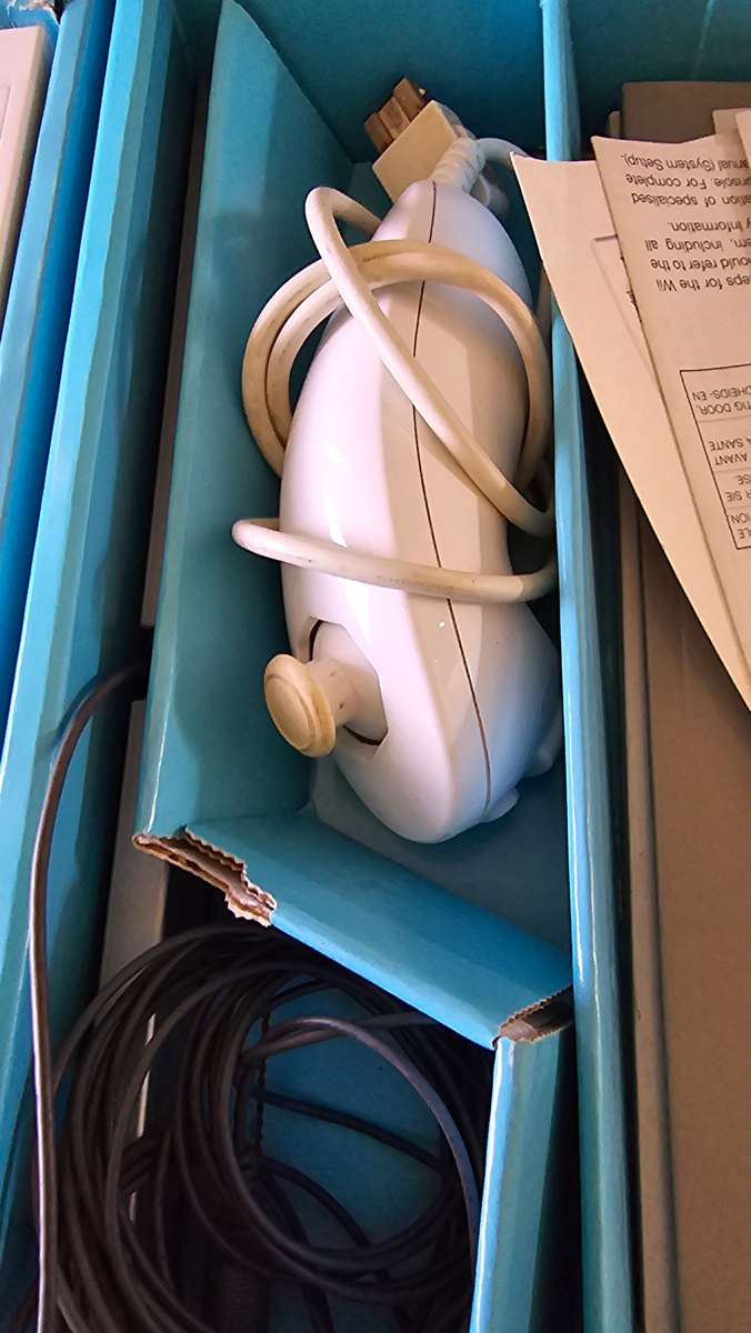 NINTENDO WII CONSOLE INCL. A REMOTE,NUNCHUK ADAPTER AND CABLES( NO POWER SUPPLY) WITH ORIGINAL BOX