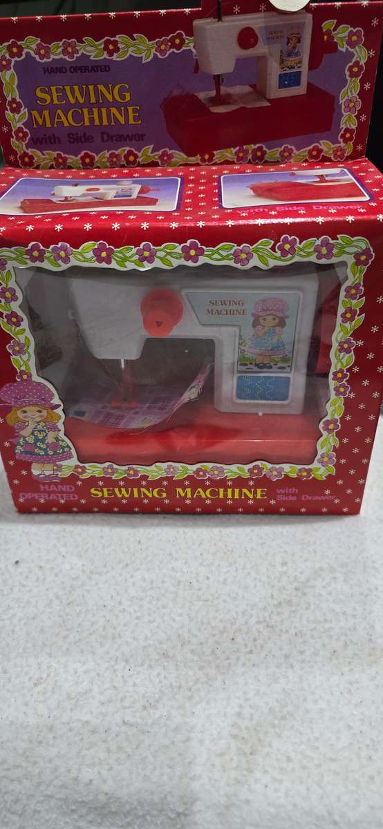 VINTAGE KIDS HAND OPERATED SEWING MACHINE WITH SLIDE DRAWER