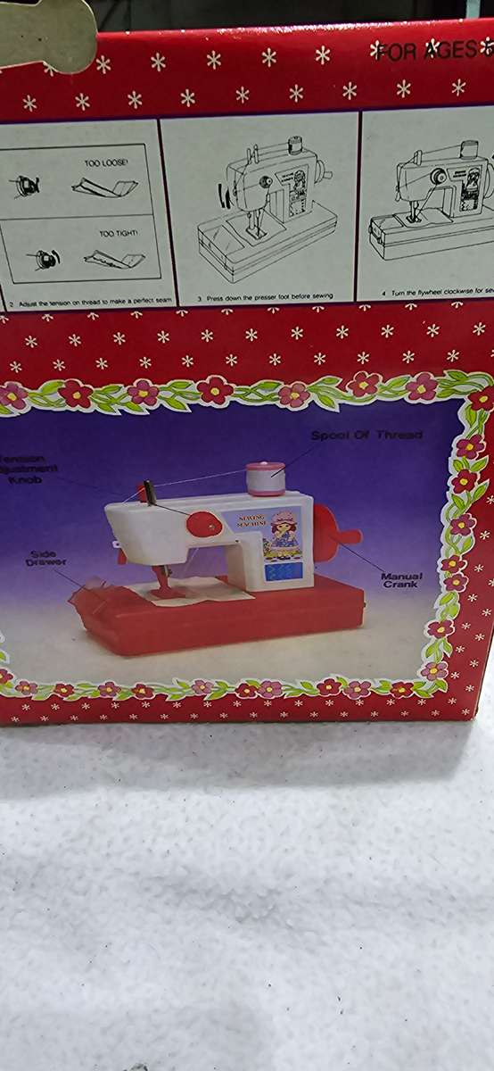 VINTAGE KIDS HAND OPERATED SEWING MACHINE WITH SLIDE DRAWER