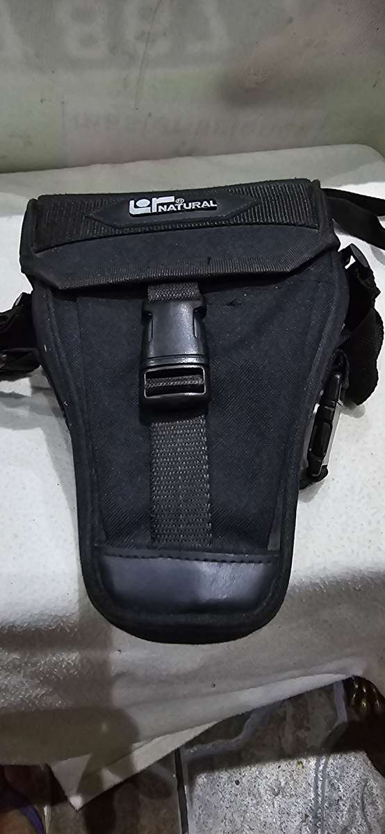 NIKON F601 CAMERA WITH LENS ,CASE AND A SPARE FILM ROLL