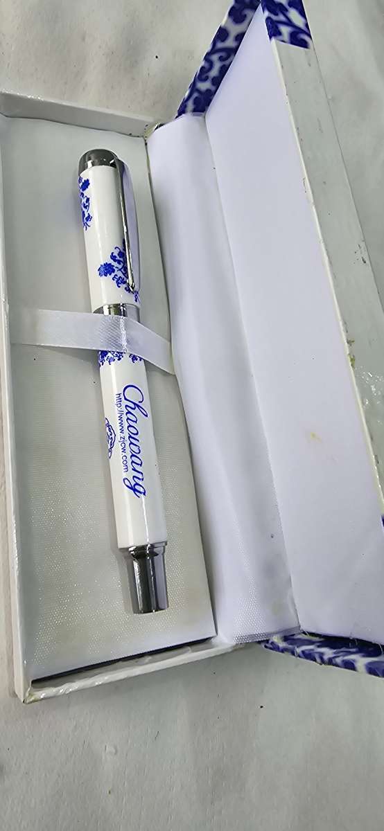 PORCELAIN BLUE AND WHITE PEN(NEEDS INK REFILL)IN ORIGINAL BOX
