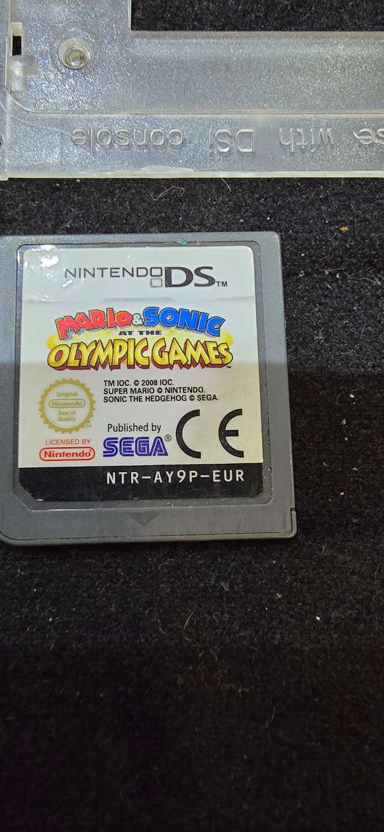 NINTENDO DS LITE INCL.A GAME CARTRIDGE MARIO & SONIC(WORKS, NO CABLES)