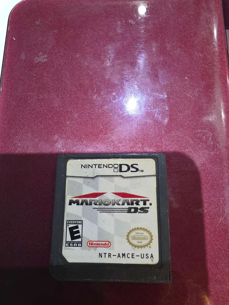 Nintendo DS XL Handheld Console with Game Cartridge