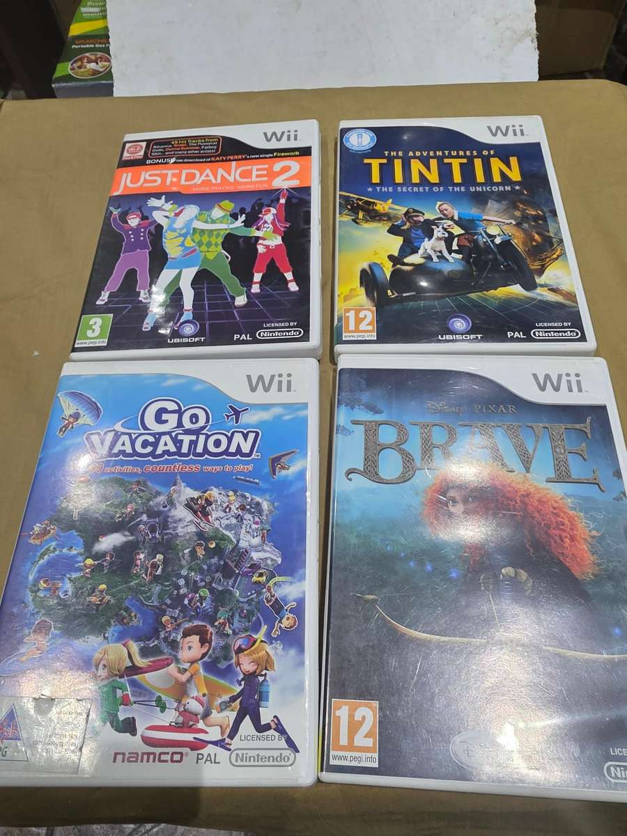 NINTENDO WII CONSOLE INCL.POWER SUPPLY, REMOTE ,8 GAME DISCS & ASSESCORIES