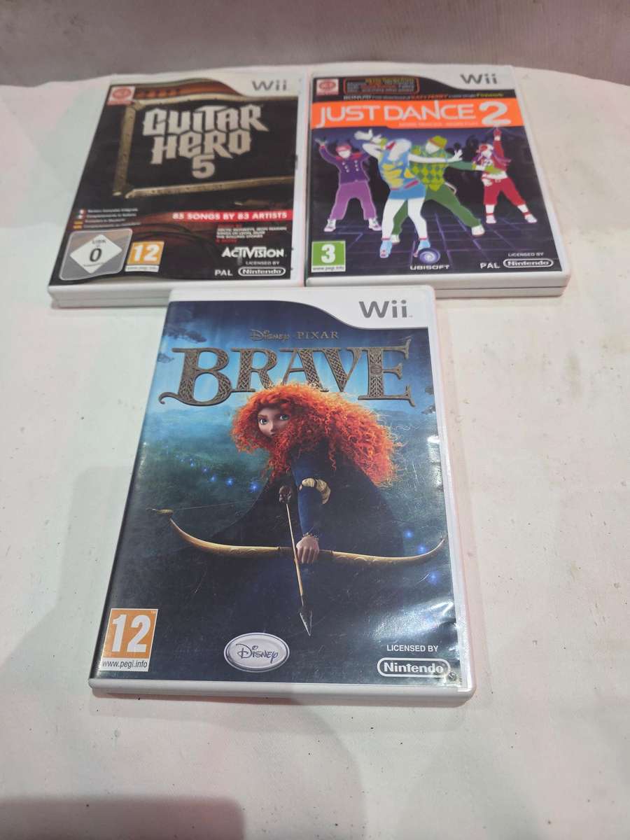 NINTENDO WII INCLUDES 9 GAME DISCS AND POWER SUPPLY