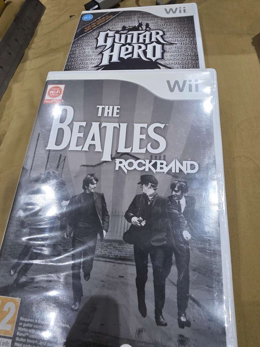 NINTENDO WII INCL.2 GAME DISCS, POWER SUPPLY, ETC..